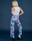 Back view of Floral Painted Work Pants in Blue and Cropped Tank in Vintage Tee white on Madeline