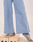 Indigo Wide Leg Trousers in Light Wash pant leg close up on Jerrod