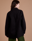 Ripstop Field Coat in Basic Black back view on Alex