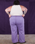 Back view of Overdyed Wide Leg Trousers in Faded Grape and Tank Top in vintage tee off-white