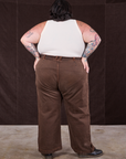 Back view of Overdyed Wide Leg Trousers in Brown and Tank Top in vintage tee off-white on Sam
