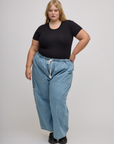 Baby Tee in Basic Black and light wash denim drop pocket pants on Juliet
