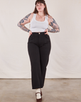 Sydney is 5'9" and wearing M Work Pants in Black paired with a Cropped Tank in vintage tee off-white