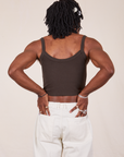 Back view of Cropped Cami in Espresso Brown and vintage tee off-white Western Pants worn by Jerrod