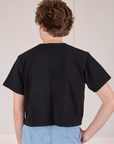 Cropped Burly Tee in Basic Black back view on Quinn