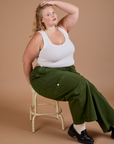 Drop Pocket Cargo Pants in Evergreen and Cropped Tank in vintage tee white worn by Juliet