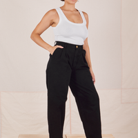 Angled view of Heavyweight Trousers in Basic Black and vintage off-white Cropped Tank Top