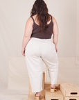 Back view of Heavyweight Trousers in Vintage Tee Off-White and espresso brown Cropped Cami worn by Ashley.