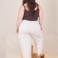 Back view of Heavyweight Trousers in Vintage Off-White and espresso brown Cropped Cami worn by Ashley.