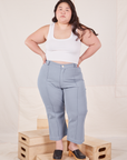 Ashley is 5'7" and wearing 1XL Petite Heritage Westerns in Periwinkle paired with vintage off-white Cropped Tank Top