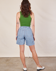 Back view of Carpenter Shorts in Light Wash and lawn green Cropped Tank