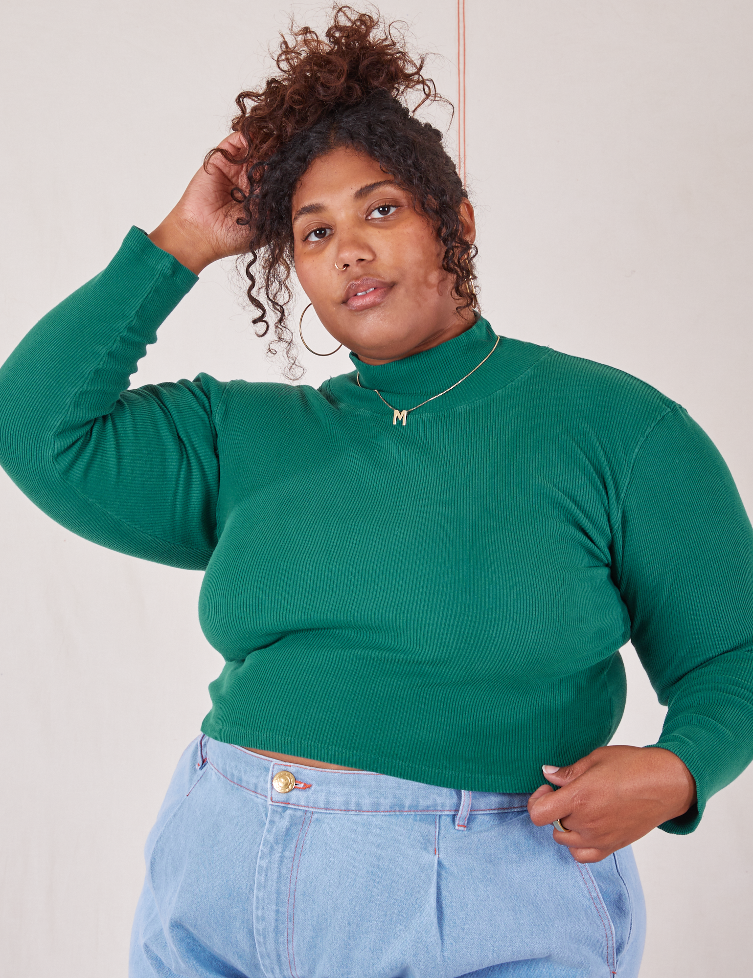 Morgan is 5&#39;5&quot; and wearing XL Essential Turtleneck in Hunter Green