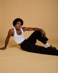Baggy Mid-Rise Trousers in Basic Black and vintage tee white Cropped Tank on Jerrod