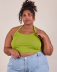 Morgan is 5'5" and wearing XL Halter Top in Gross Green