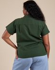 Pantry Button-Up in Swamp Green back view on Meghna