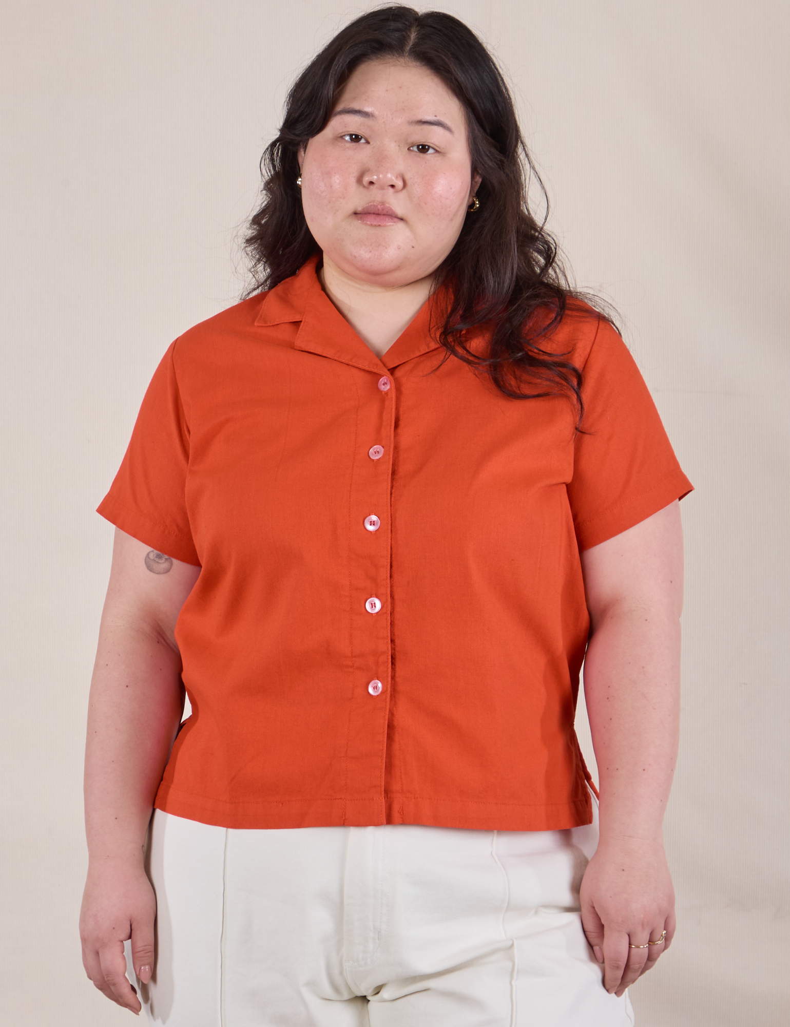 Ashley is 5'7" and wearing L Pantry Button-Up in Chili Red