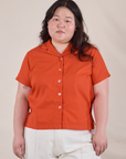 Ashley is 5'7" and wearing L Pantry Button-Up in Chili Red