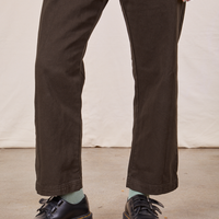 Pant leg close up of Petite Short Sleeve Jumpsuit in Espresso Brown worn by Hana