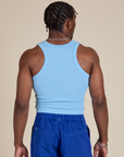 Racerback Tank in Baby Blue back view on Isaac