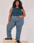Morgan is 5’5’” and wearing 2XL Railroad Carpenter Jeans in Baby Blue