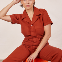 Tiara is wearing Short Sleeve Jumpsuit in Paprika