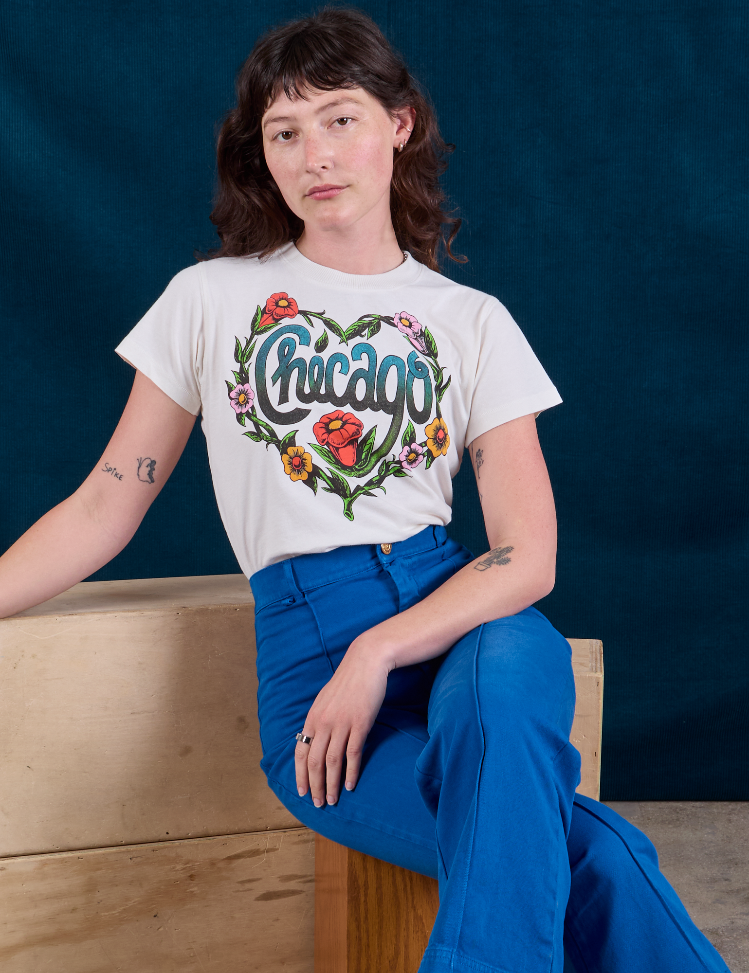 Chicago Tourist Tee and royal blue Western Pants on Alex
