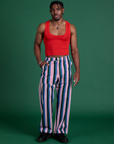 Isaac is 5’10” and wearing M Work Pants in Pacific Stripe paired with mustang red Cropped Tank