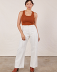 Tiara is wearing Tank Top in Burnt Terracotta tucked into vintage tee off-white Western Pants