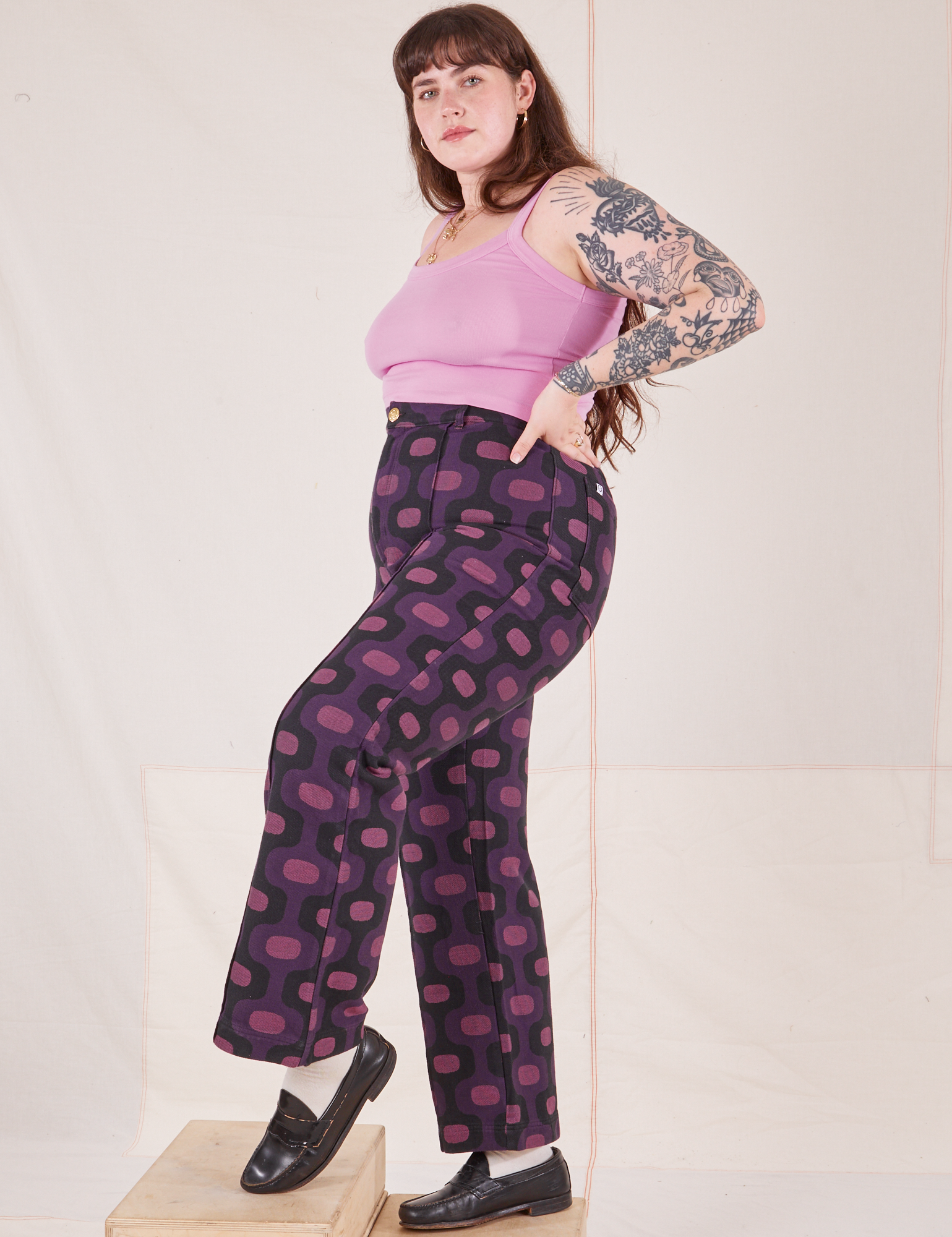 Side view of Western Pants in Purple Tile Jacquard and bubblegum pink Cami on Sydney