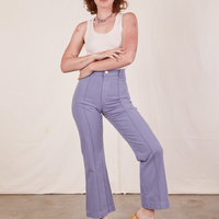Alex is wearing Western Pants in Faded Grape and a vintage off-white Tank Top