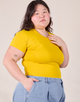 Baby Tee in Golden Yellow angled front view on Ashley