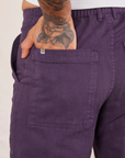 Back pocket close up of Work Pants in Nebula Purple worn by Jesse