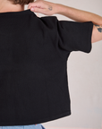 Cropped Burly Tee in Basic Black back close up on Quinn