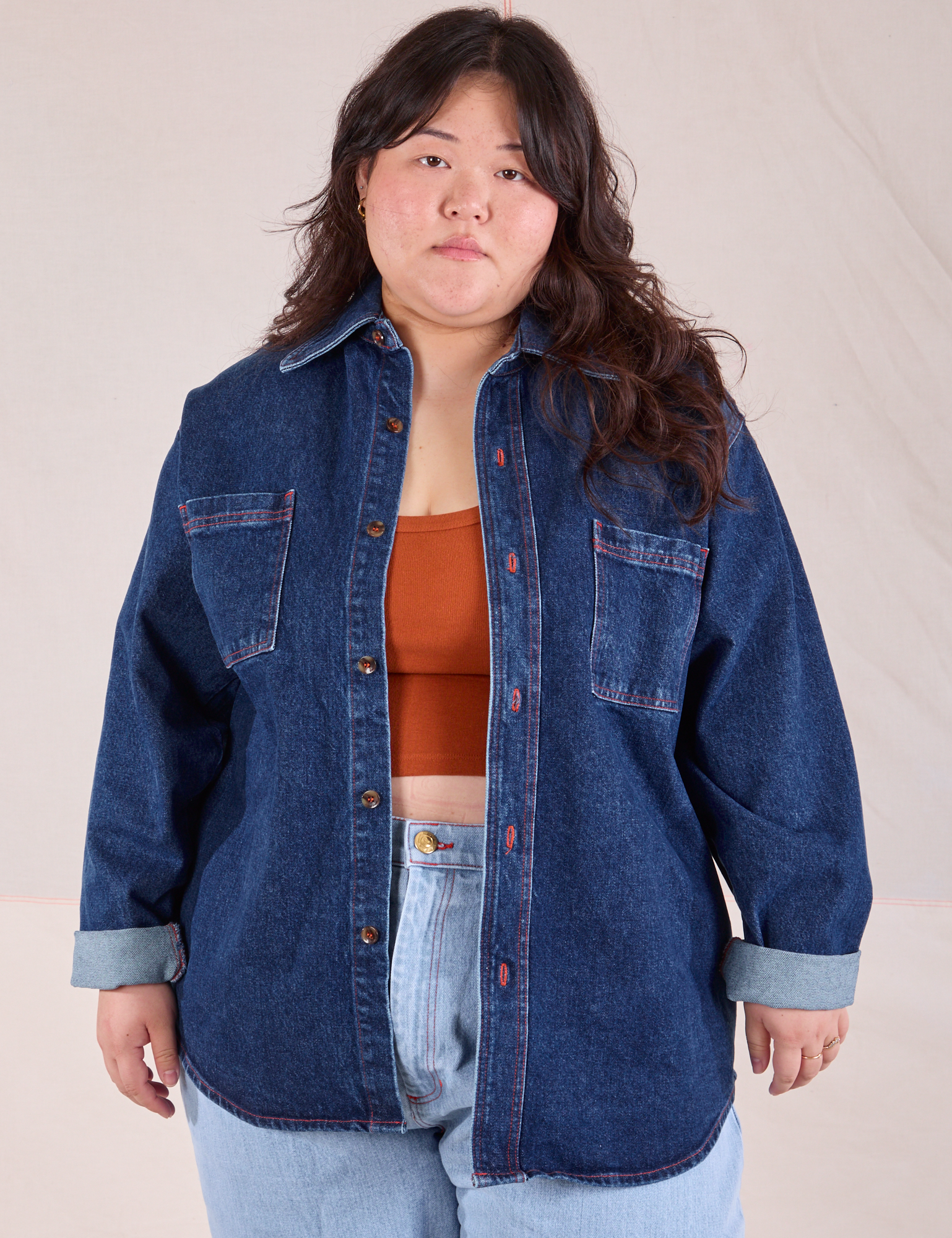 Ashley is 5'7" and wearing L Denim Overshirt in Dark Wash
