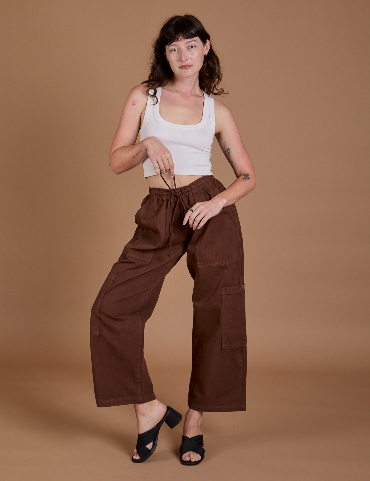Drop Pocket Cargo Pants in Fudgesicle Brown and Cropped Tank in vintage tee white on Alex