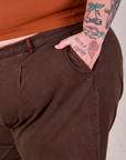 Overdyed Denim Trouser in Fudge front pocket close up with Sam's hand in the pocket