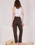 Back view of Rolled Cuff Sweat Pants in Espresso Brown and Cropped Tank in vintage tee off-white on Alex