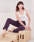 Alex is wearing Rolled Cuff Sweat Pants in Nebula Purple and vintage off-white Cropped Tank Top
