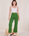 Alex is wearing Heritage Westerns in Lawn Green and Cropped Cami in vintage tee off-white