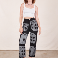 Alex is wearing Icon Work Pants in Dice and vintage off-white Cropped Cami
