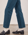 Short Sleeve Jumpsuit in Lagoon pant side leg close up on Alex