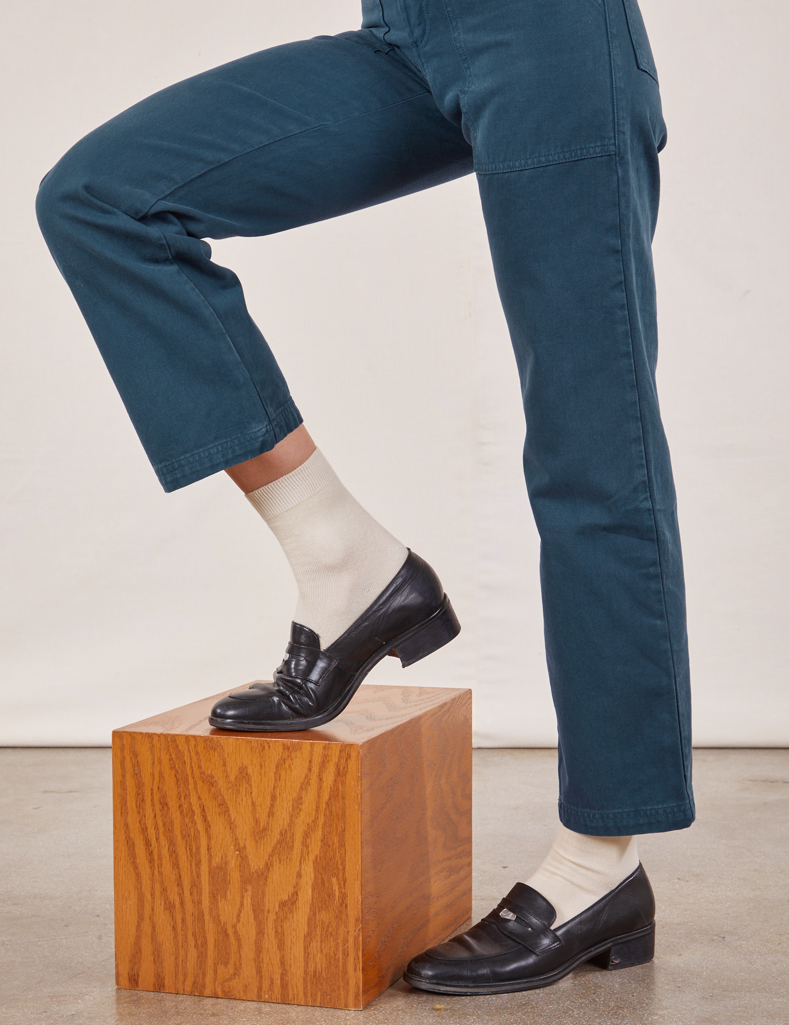 Work Pants in Lagoon pant side view close up on Alex