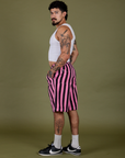 Side view of Longline Work Shorts in Bubblegum Pink and vintage tee white Cropped Tank