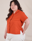 Pantry Button-Up in Chili Red angled front view of Pantry Button-Up in Chili Red on Ashley