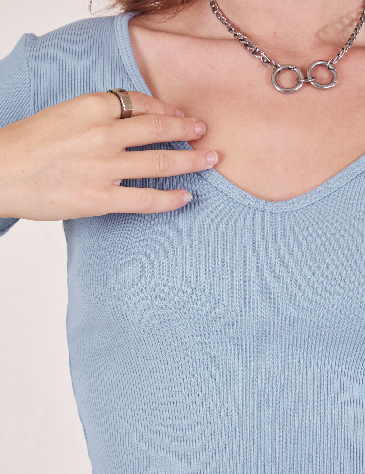 Long Sleeve V-Neck Tee in Periwinkle front close up on Alex