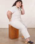 Ashley is wearing Petite Short Sleeve Jumpsuit in Vintage Tee Off-White
