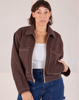 Tiara is 5'4" and wearing S Mechanic Jacket in Fudgesicle Brown