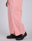 Drop Pocket Cargo Pants in Baby Pink side pant leg close up on Isaac