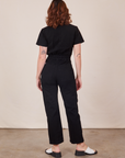 Back view of Short Sleeve Jumpsuit in Basic Black worn by Alex