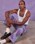 Paintstamped Work Pants in Grape and Cropped Tank in Vintage Tee Off-White worn by Jerrod